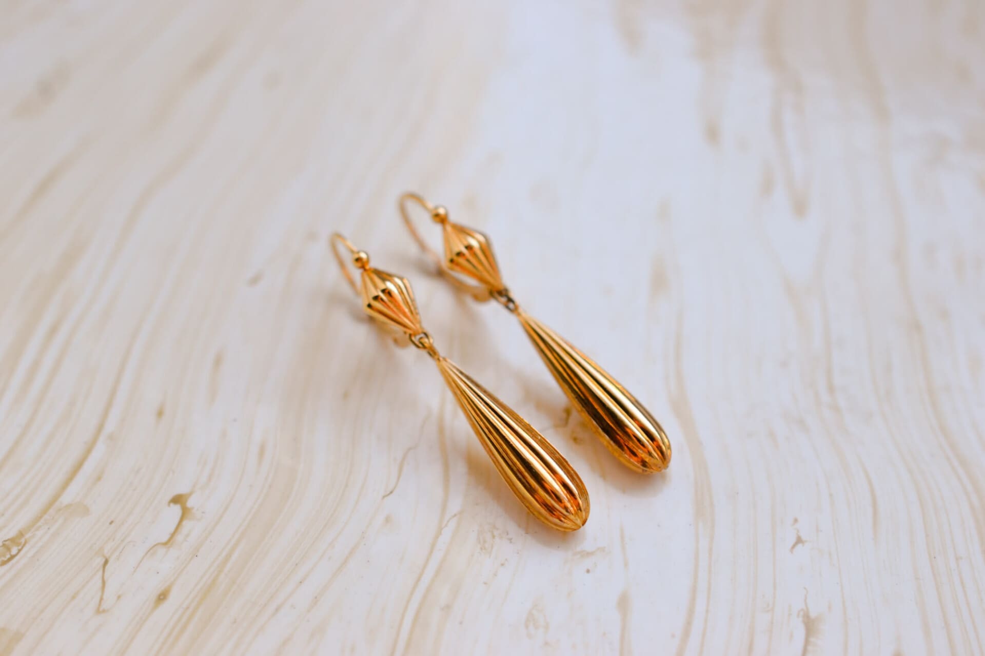 Pendants d'oreilles style fileuses