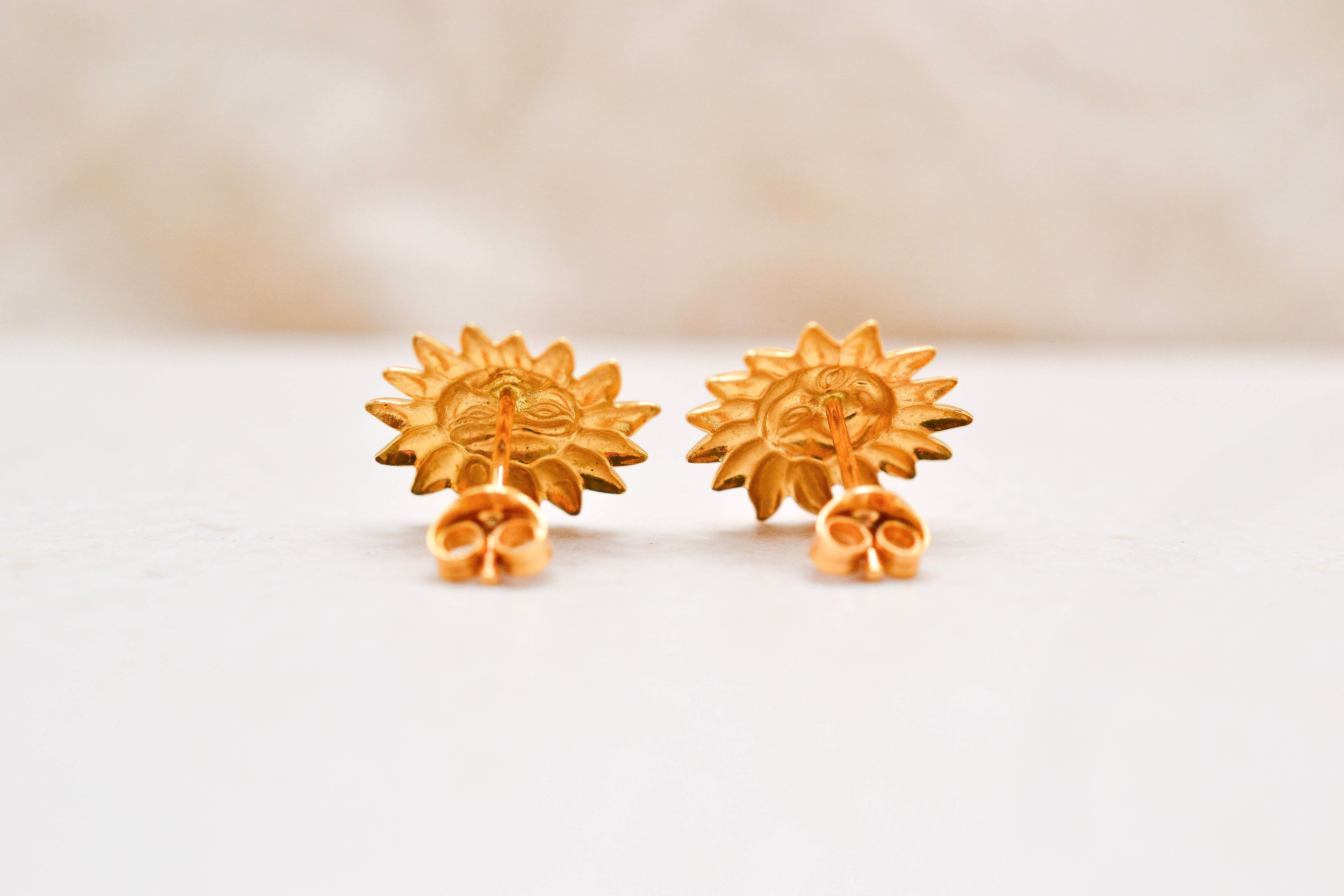 Puces d'oreilles Soleil