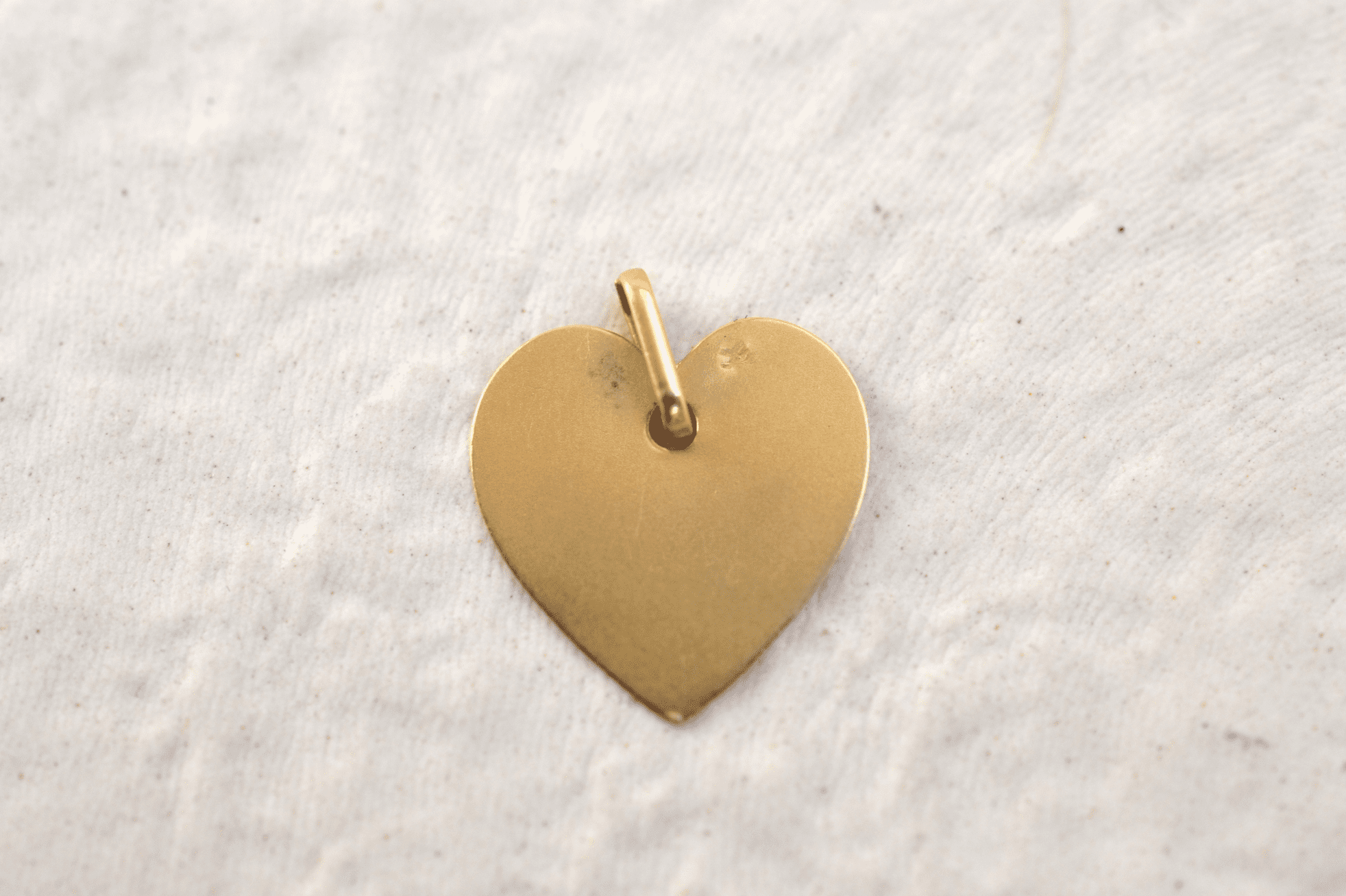Pendentif coeur gravé étoile