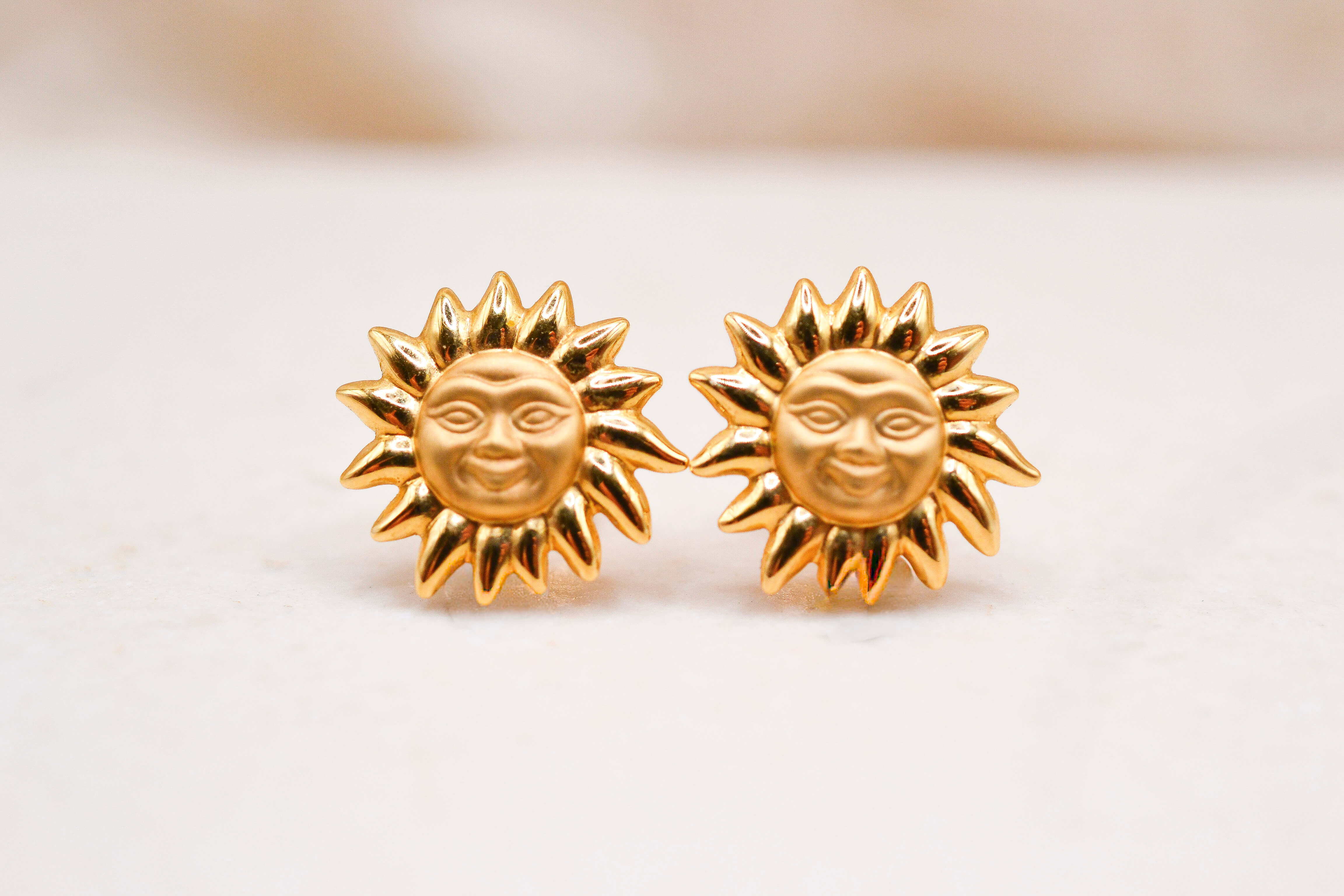 Puces d'oreilles Soleil