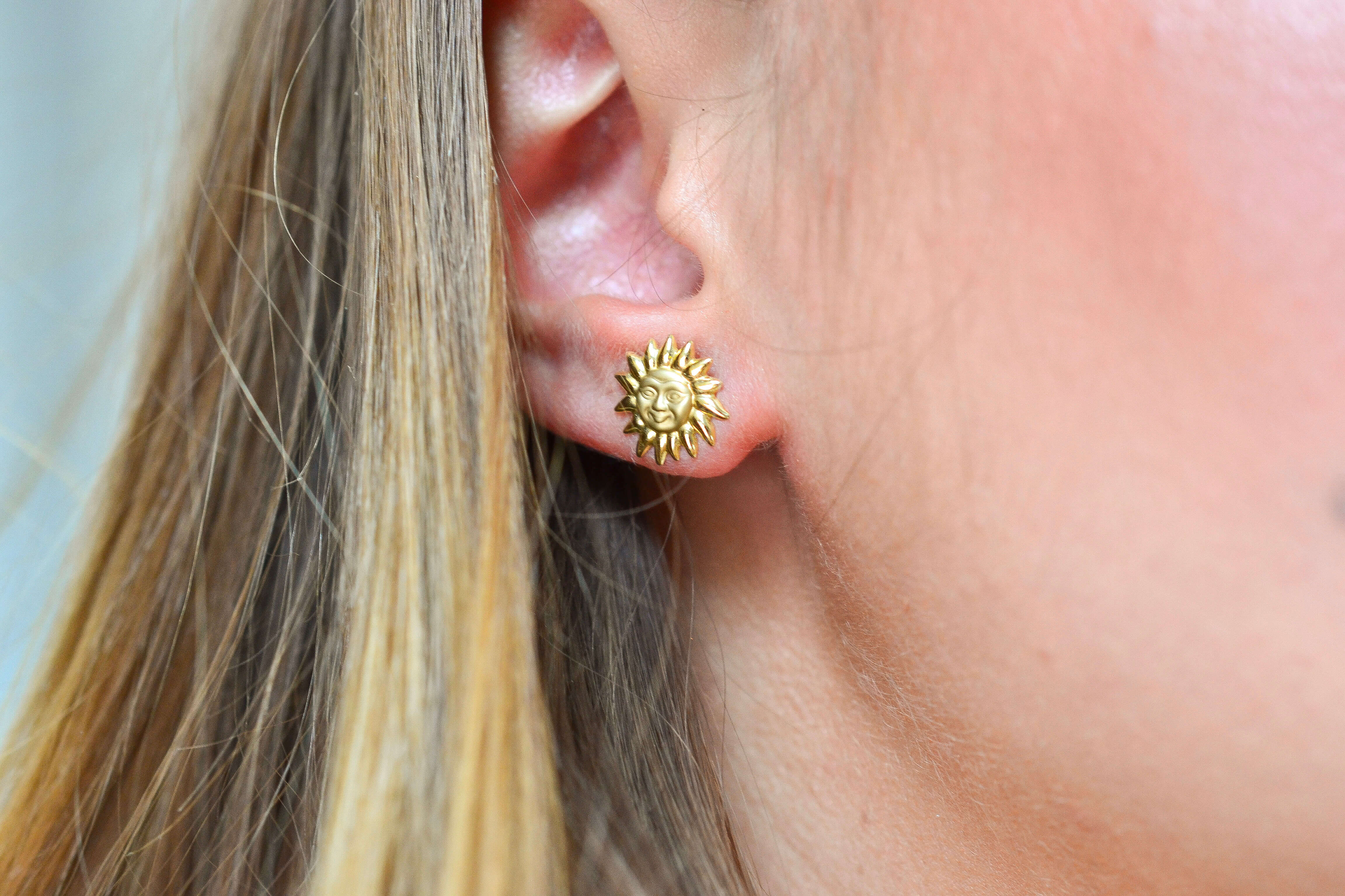 Puces d'oreilles Soleil