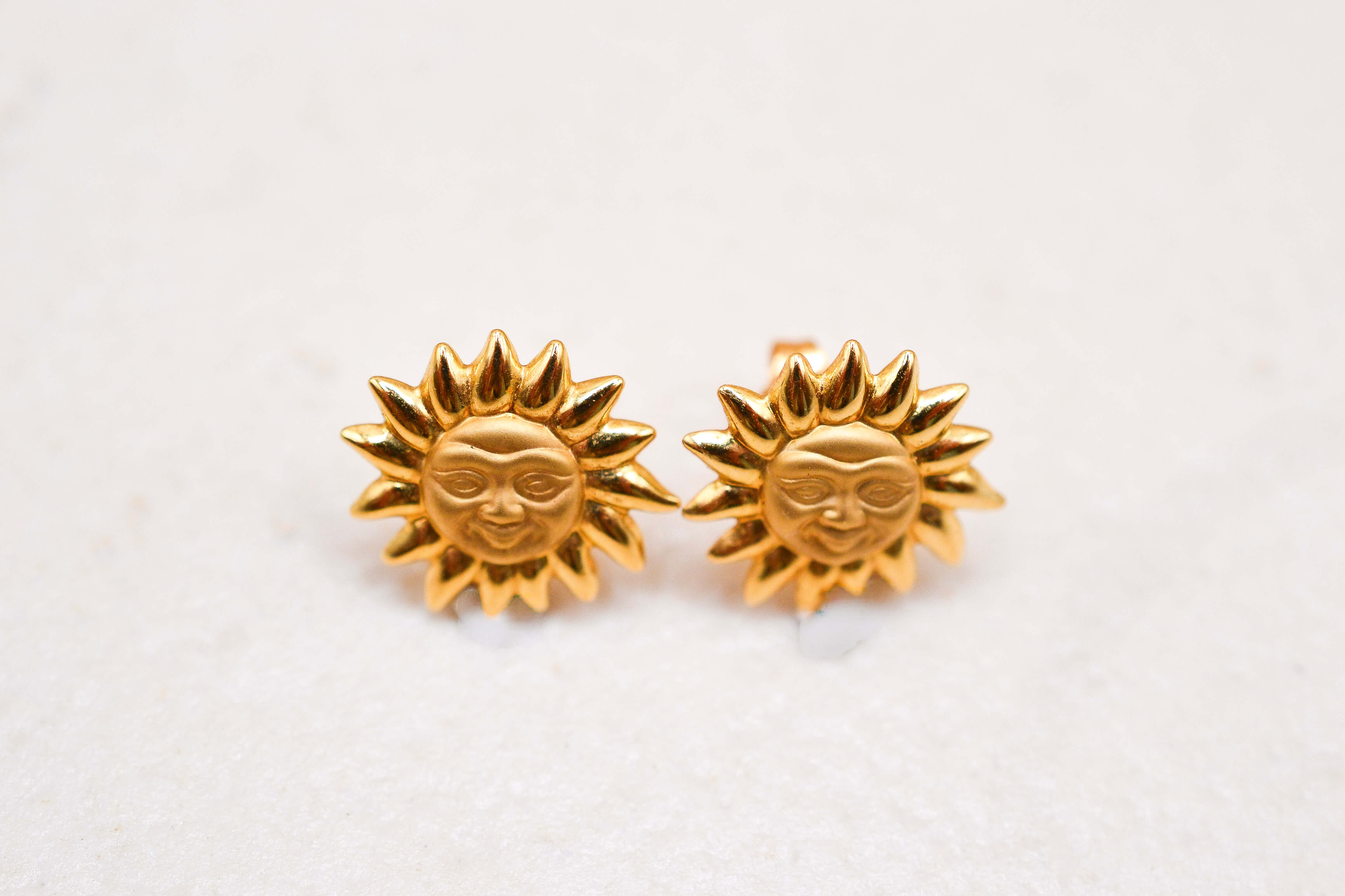 Puces d'oreilles Soleil