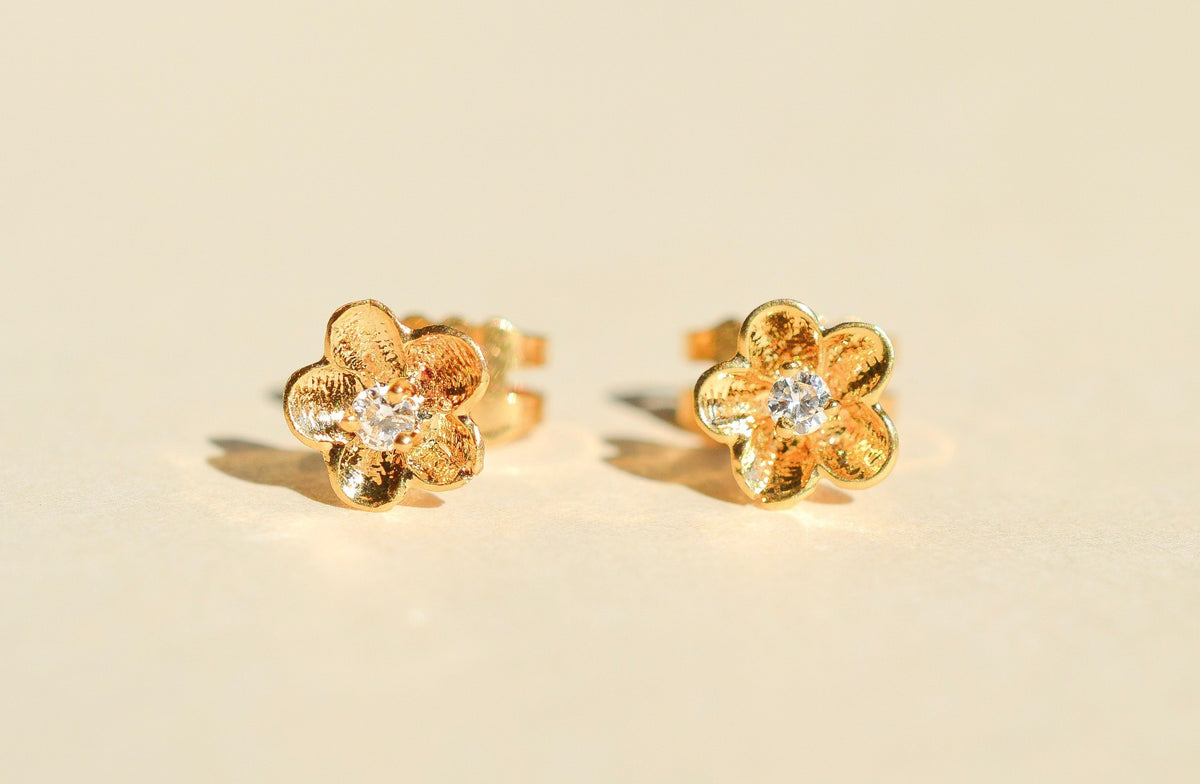 Puces d'oreilles florales diamants