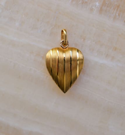 Pendentif coeur en Or jaune 18 carats à décor rainuré