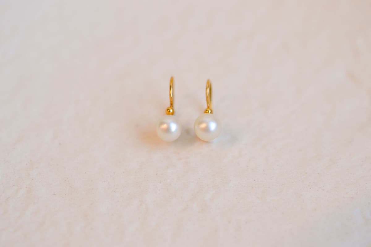 Dormeuses en Or jaune 18 carats serties de Perles