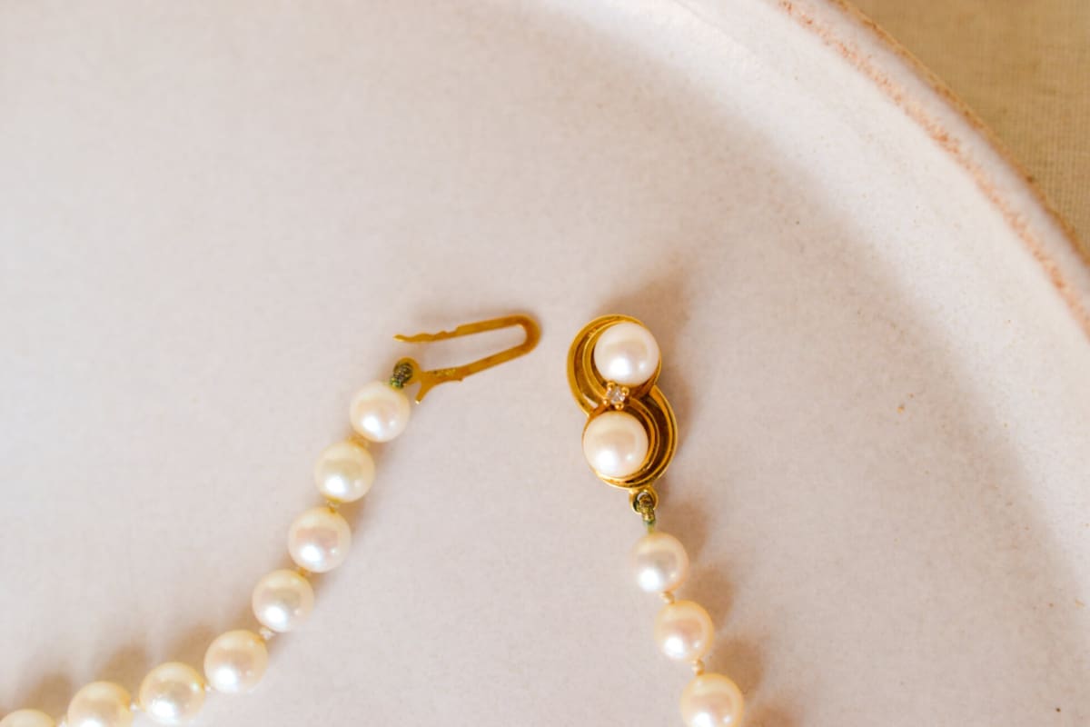 Collier en Or jaune 18 carats orné de Perles et un Diamant