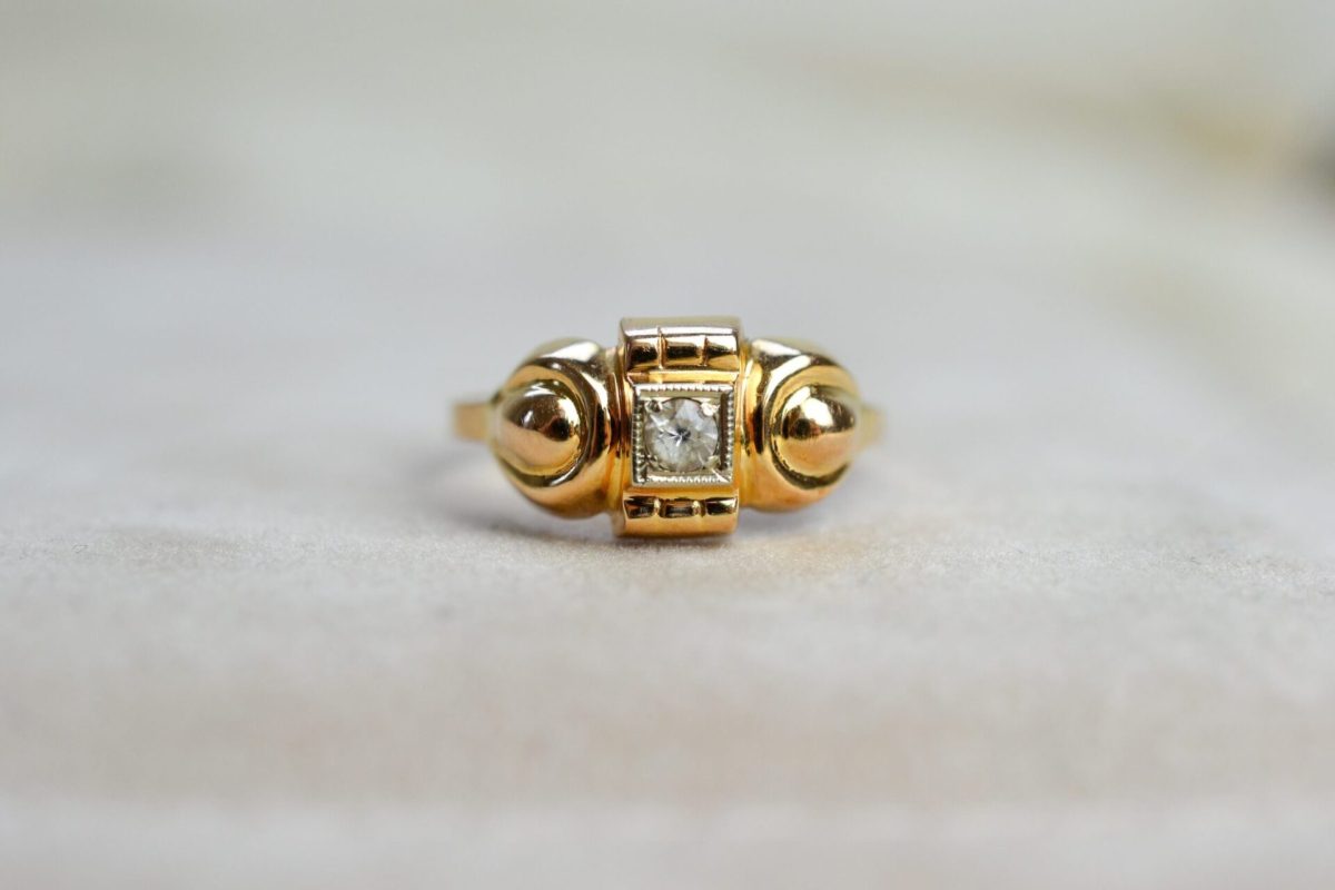 bague tank en or jaune ornee au centre d un oxyde - bague ancienne