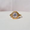 bague octogonale ajouree en or deux tons ornee d un saphir et de diamants - bague ancienne