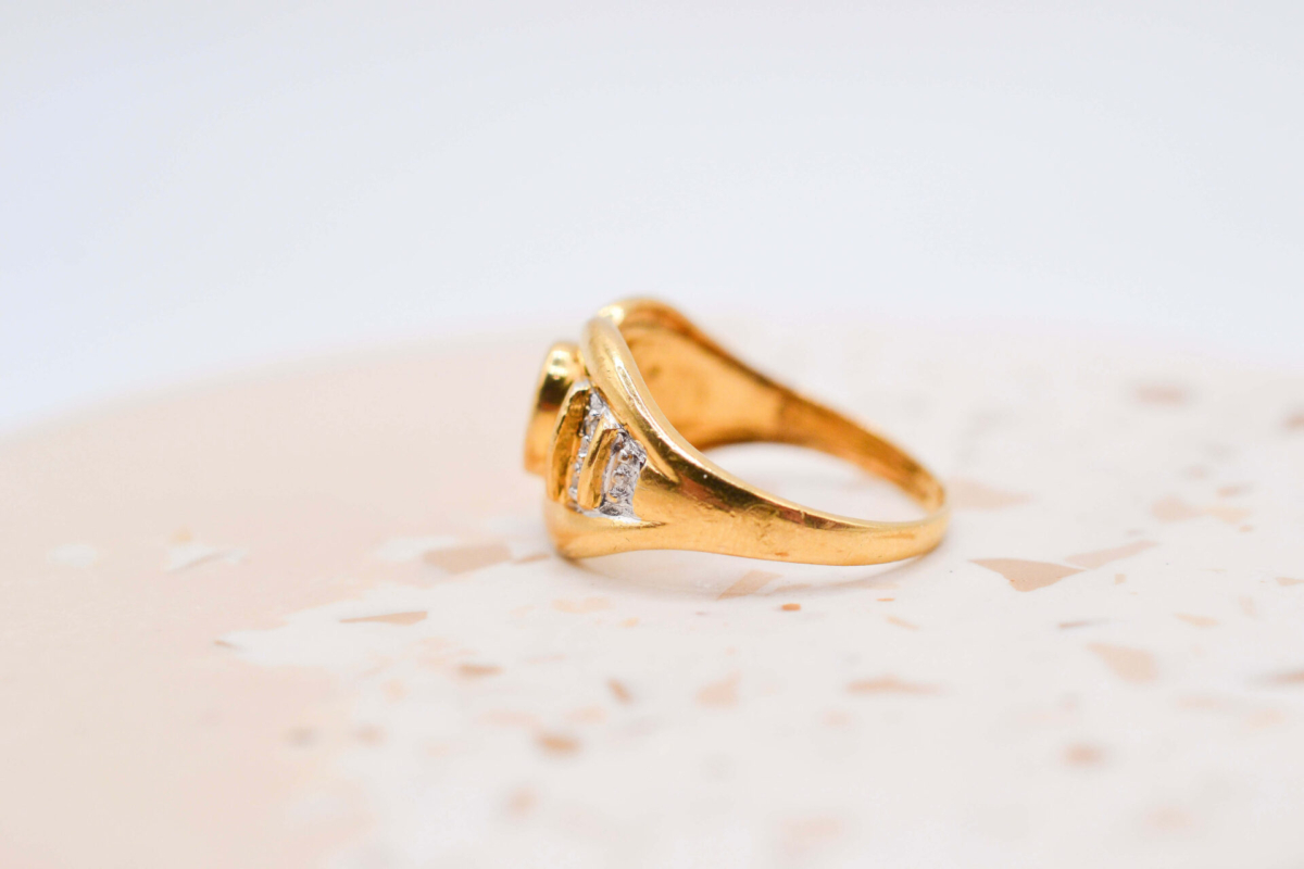 Bague nœud Emeraude Diamants